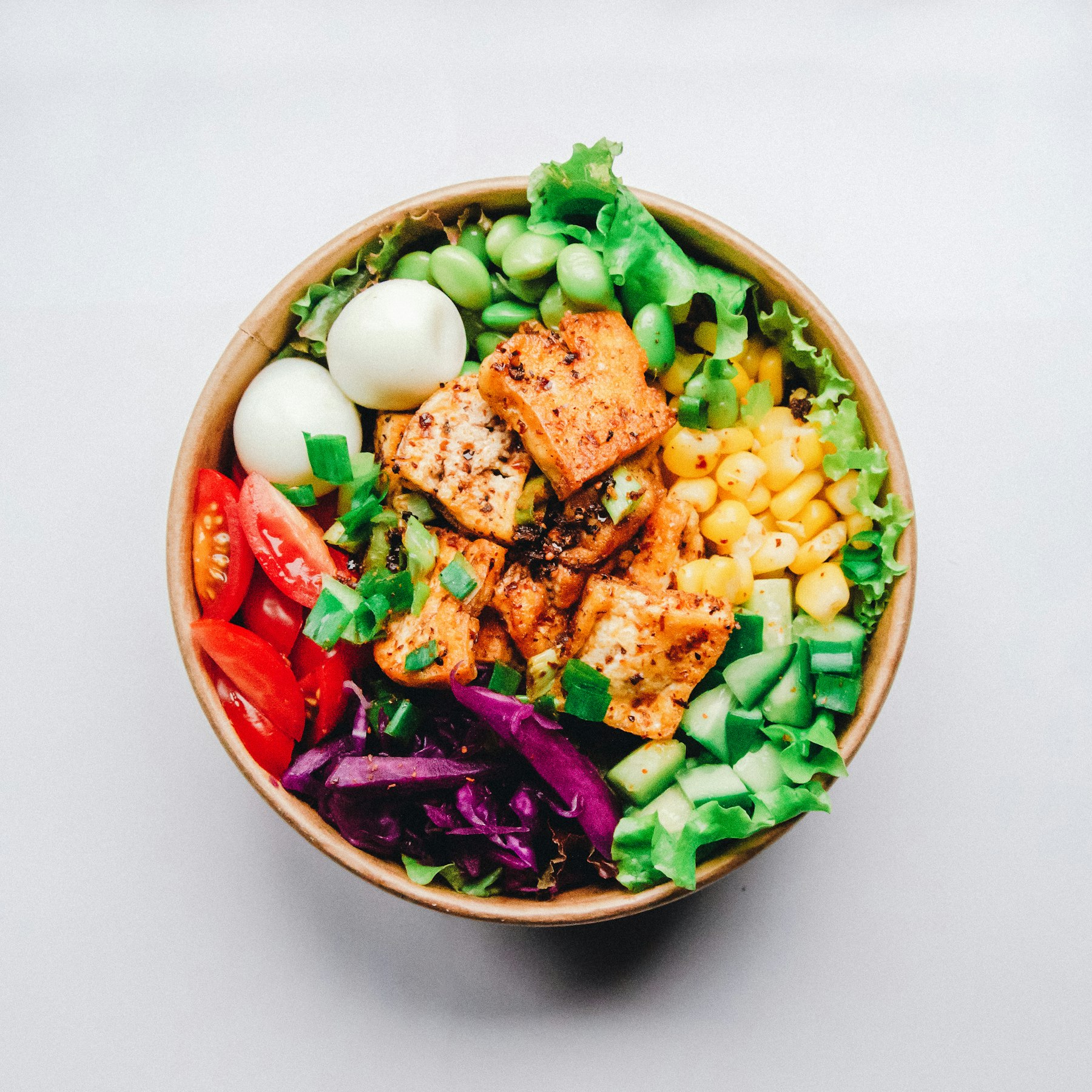 Chopped salad with grains, herbs and a glossy dressing